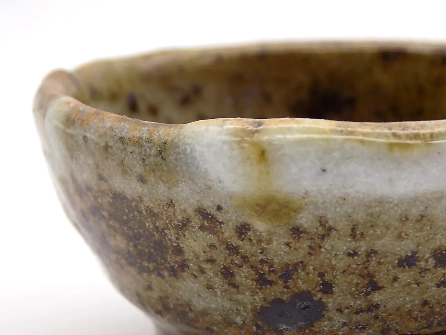 Hand-thrown ochoko with feldspar glaze, close-up detail by Timi Lantos Ceramics
