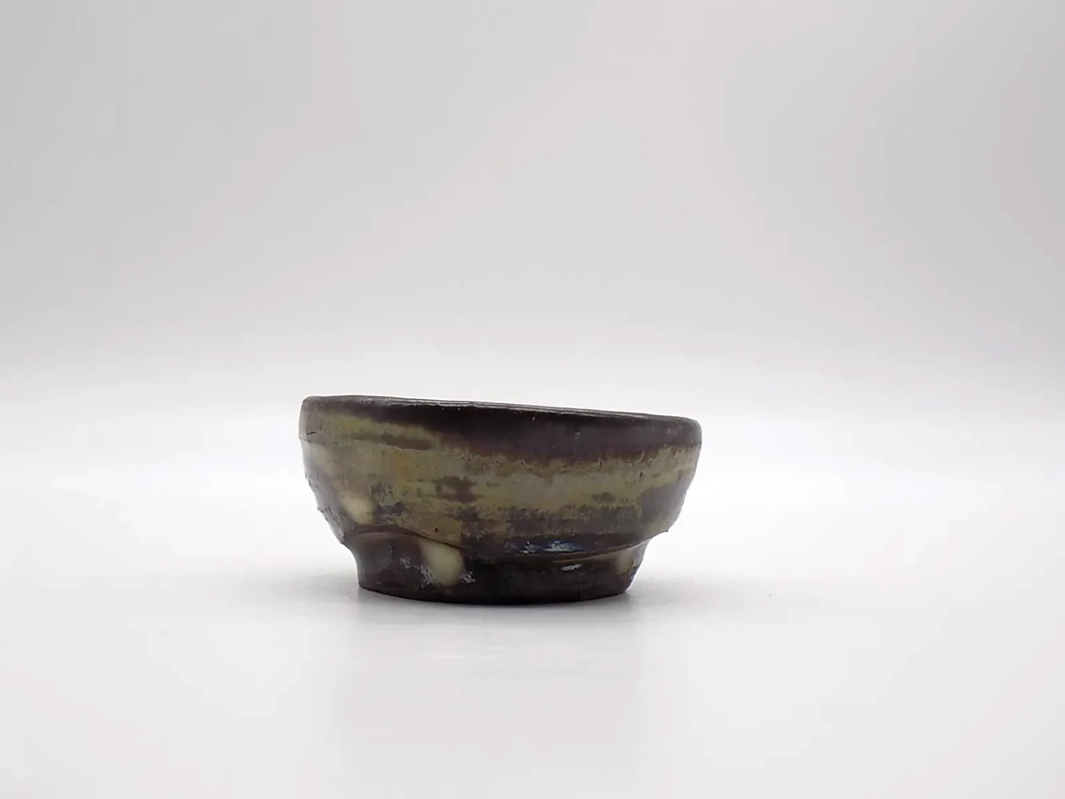 Hand-thrown minimal white ochoko, detail shot by Timi Lantos Ceramics