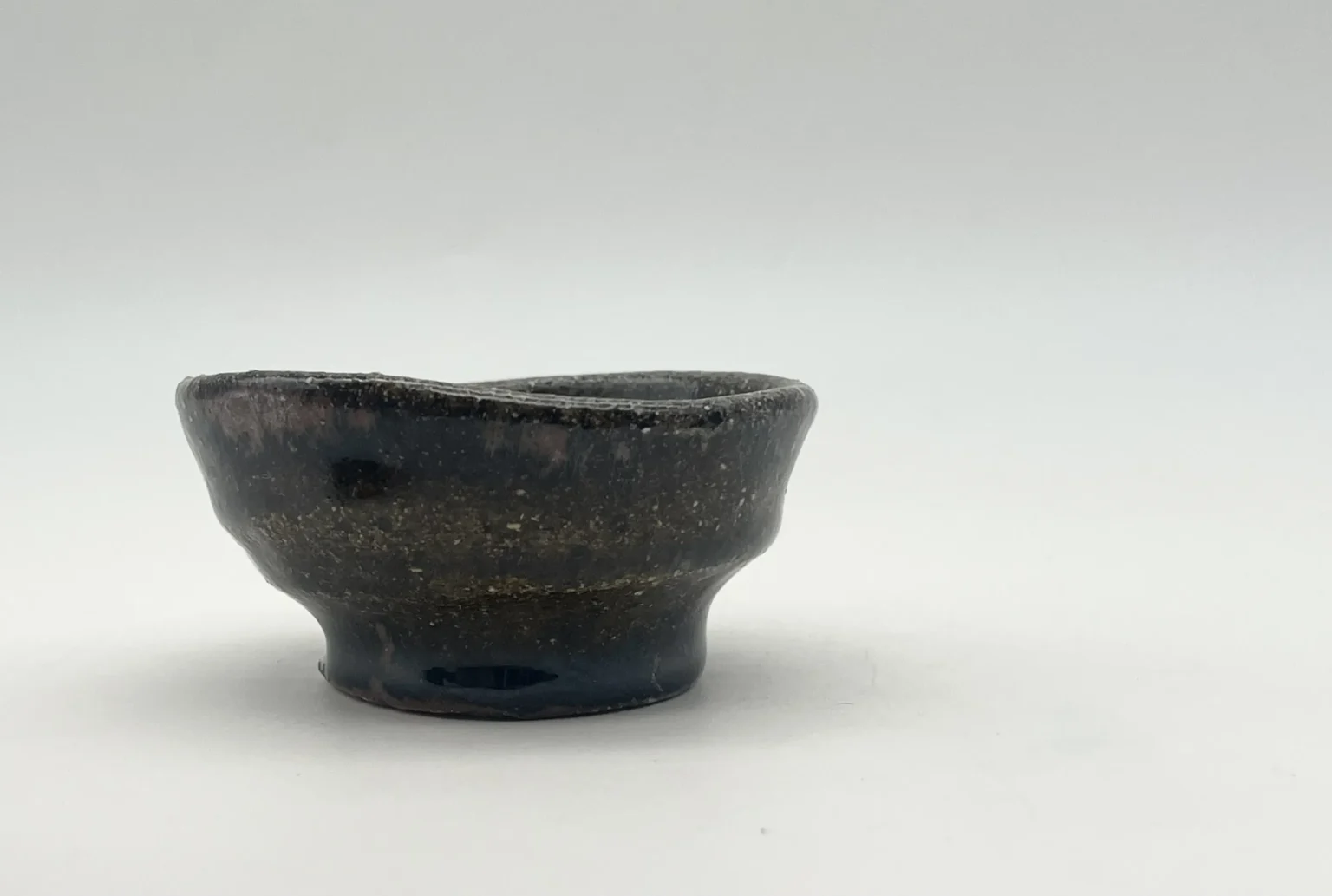 Ochoko with earthy ash cover by Timi Lantos Ceramics
