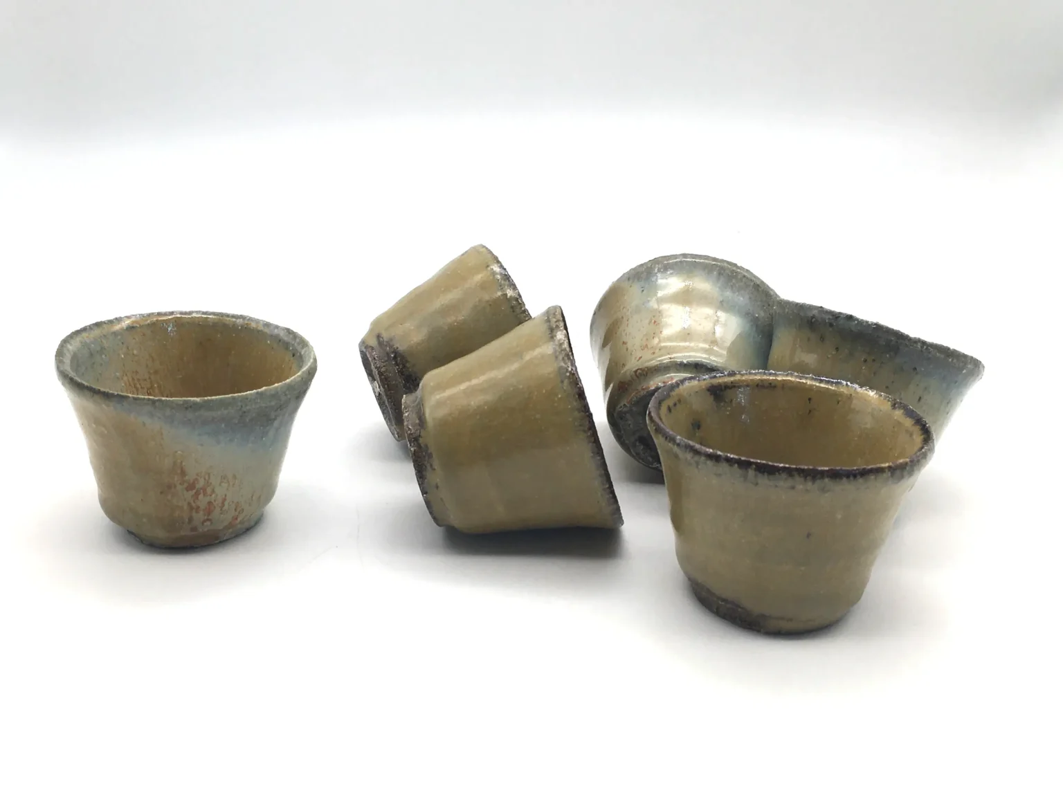 Ochoko cups with beige ash glaze by Timi Lantos Ceramics