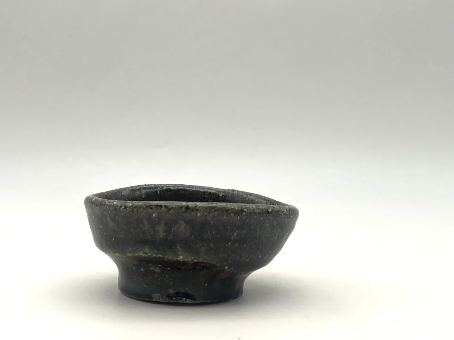 Ochoko with ash glaze in wabi-sabi style by Timi Lantos Ceramics