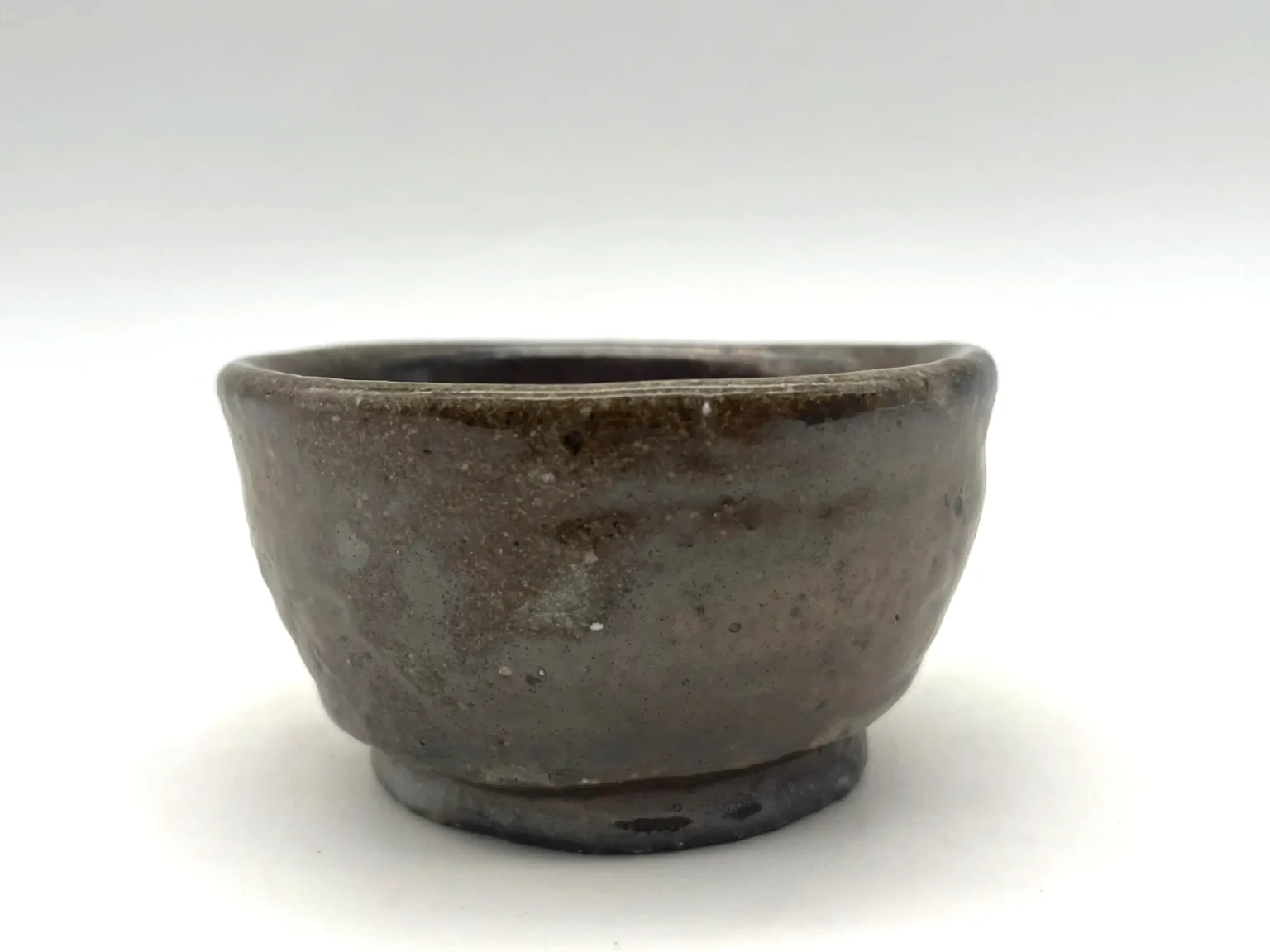 Ochoko with ash iron brown glaze by Timi Lantos Ceramics
