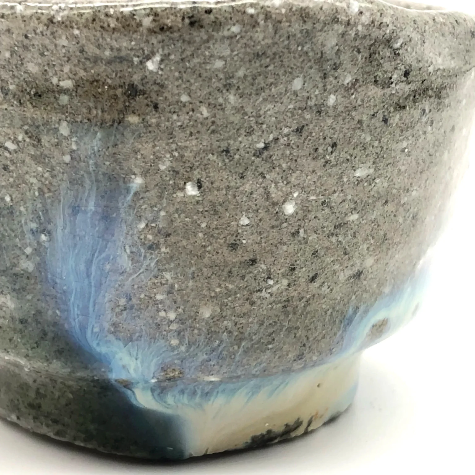 Close-up view ochoko in earthy brown wild clay by Timi Lantos Ceramics
