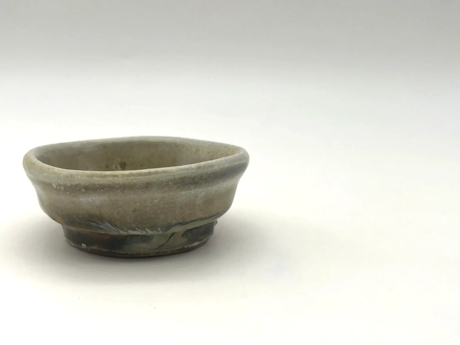 Ochoko with natural glaze, side view by Timi Lantos Ceramics