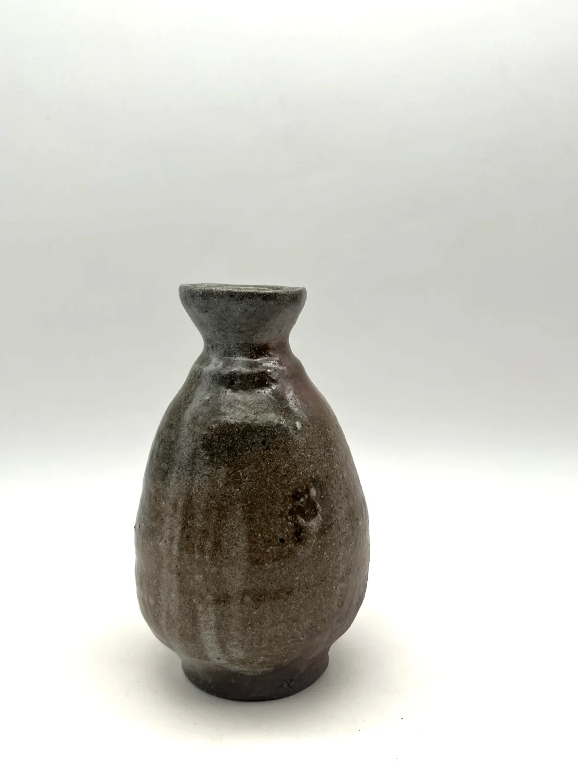 Sake bottle with white ash cover by Timi Lantos Ceramics