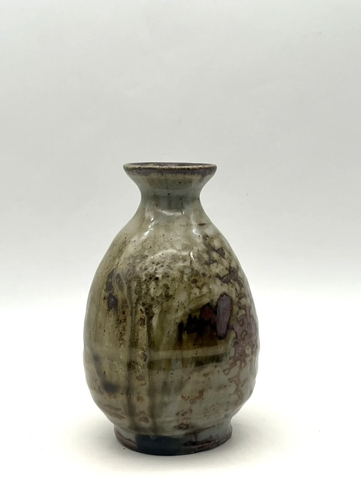 Sake bottle with brown carbon trap effect by Timi Lantos Ceramics