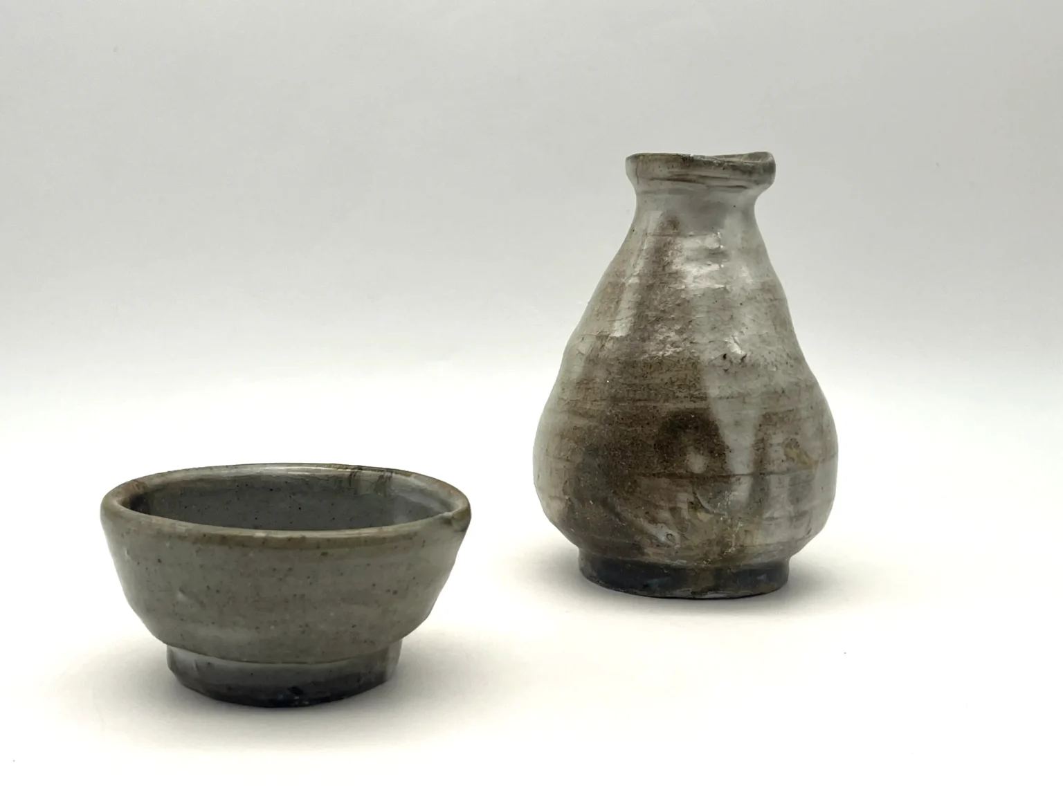 Sake bottle with carbon trap and firecolor effects by Timi Lantos Ceramics