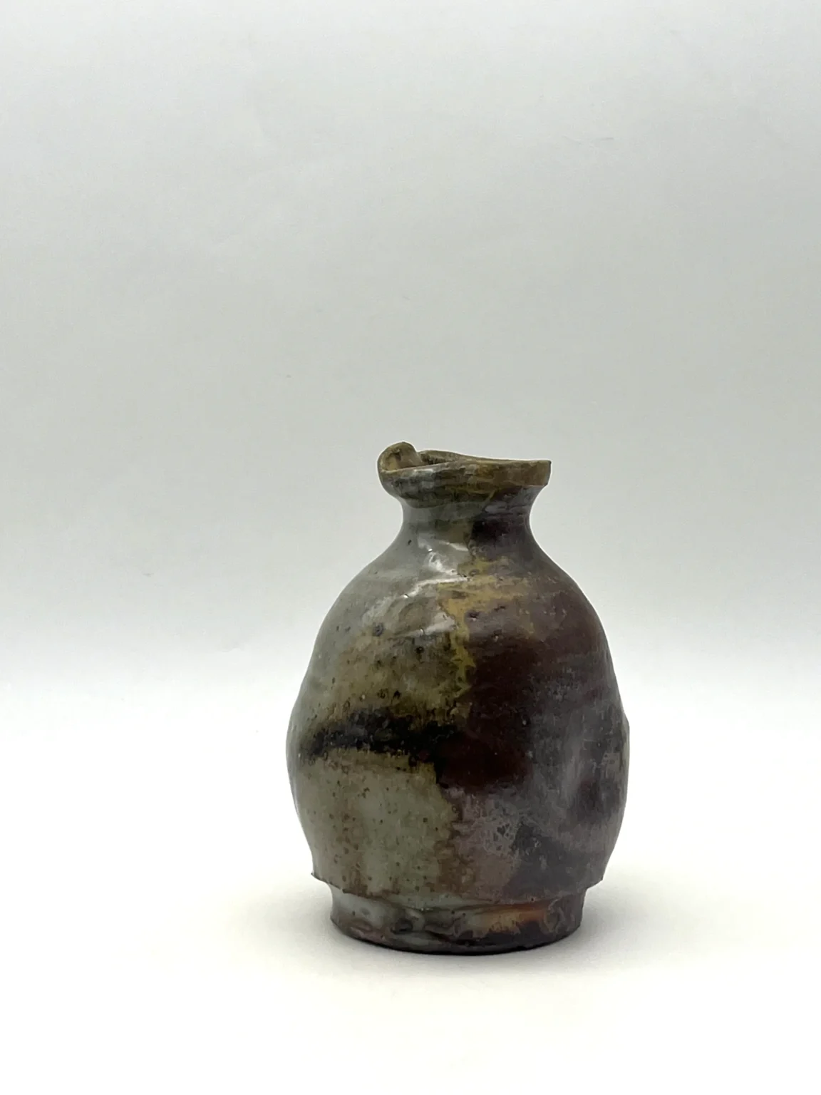 Wabi-sabi anagama earthy sake bottle by Timi Lantos Ceramics