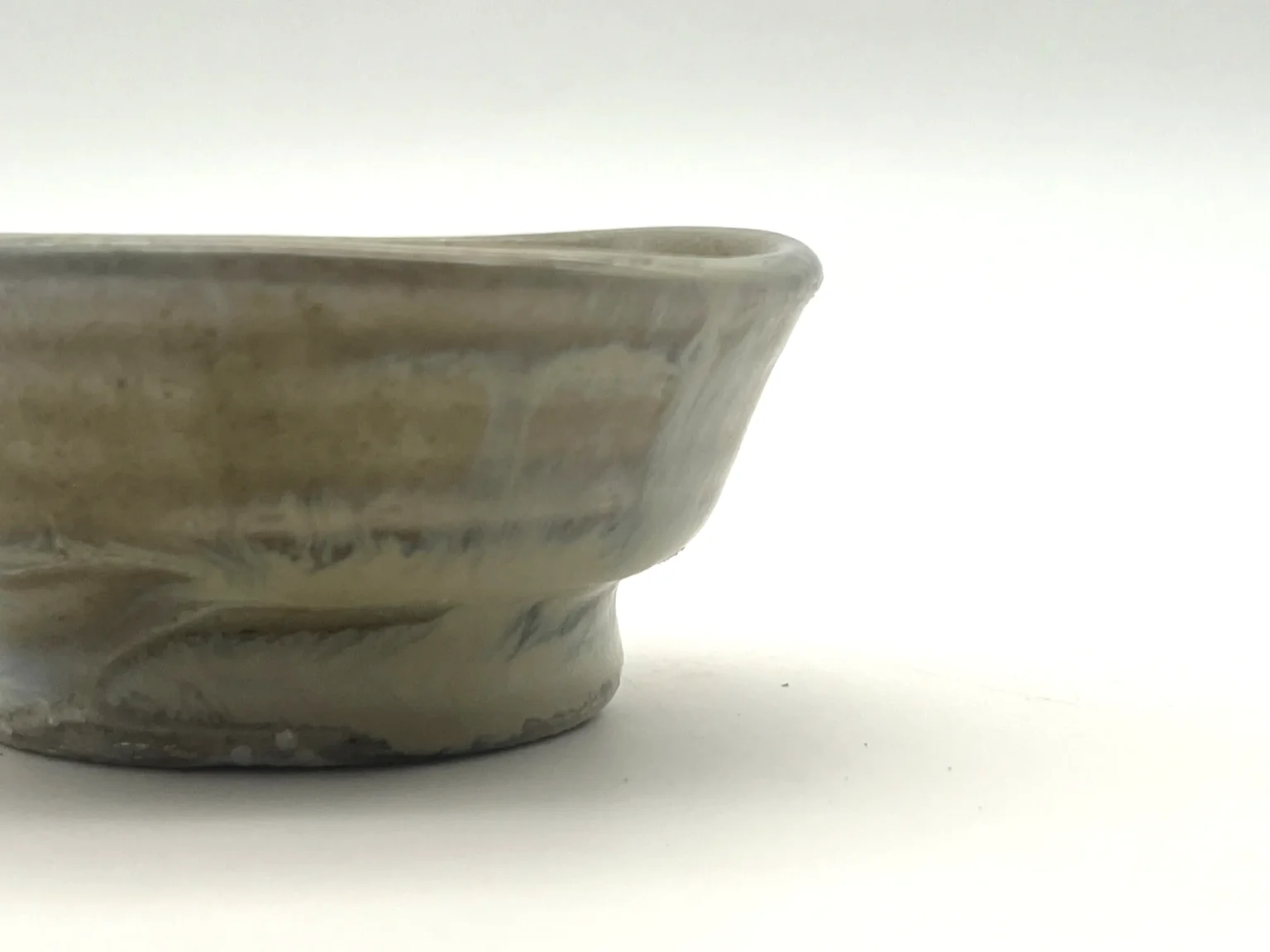 Sake cup with beige ash glaze, side view by Timi Lantos Ceramics