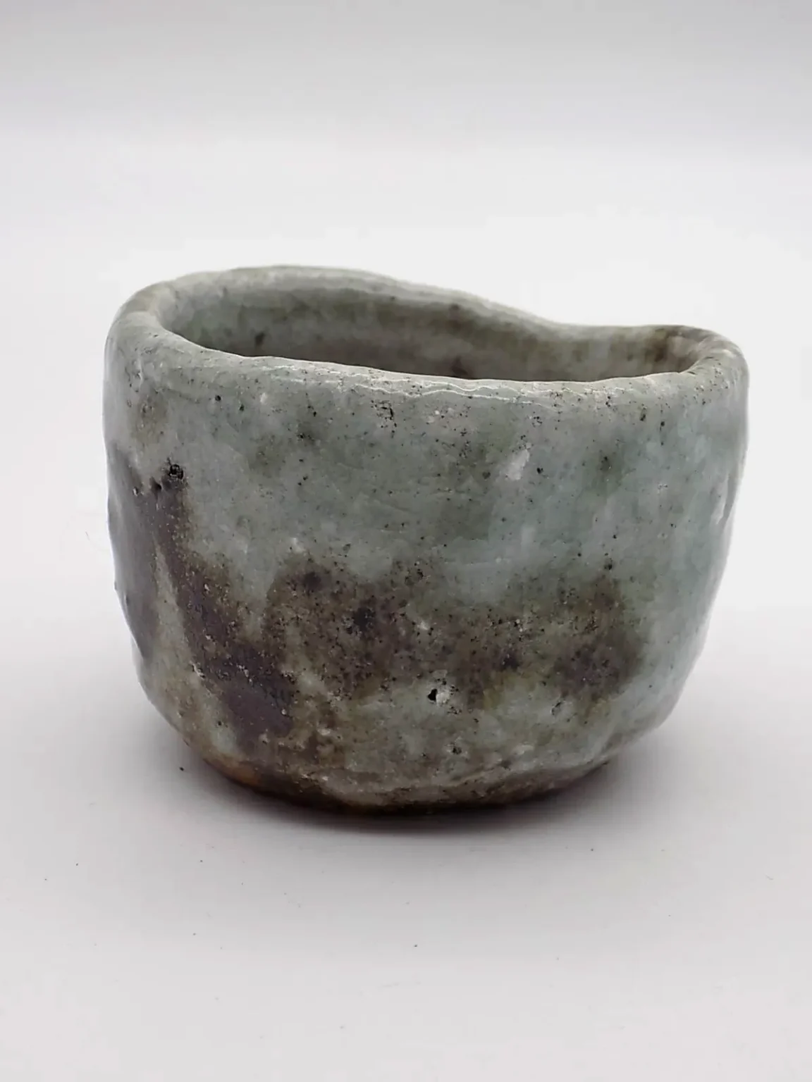 Sake cup with earthy tones, side view by Timi Lantos Ceramics