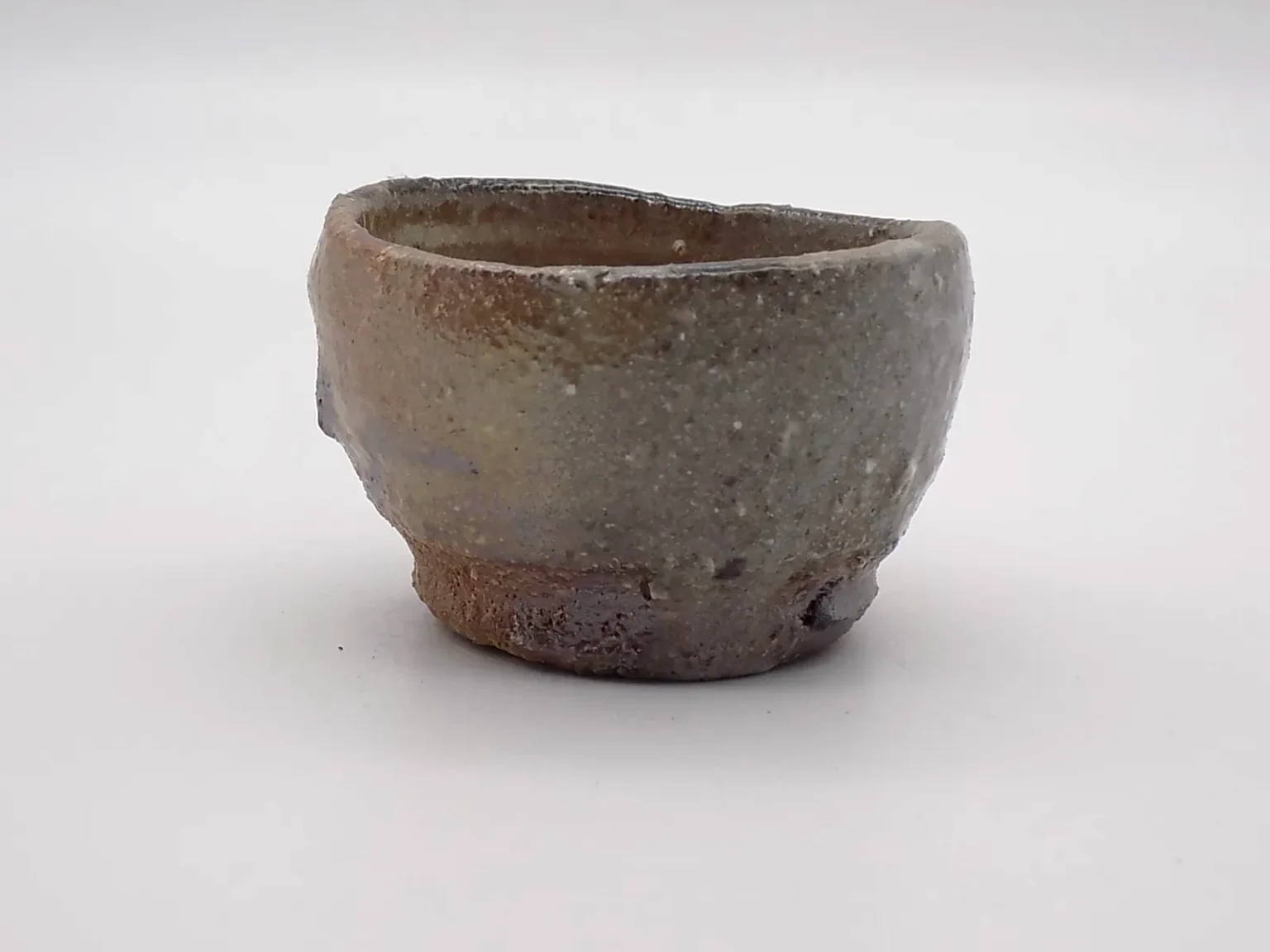 Rustic brown sake cup, side view by Timi Lantos Ceramics