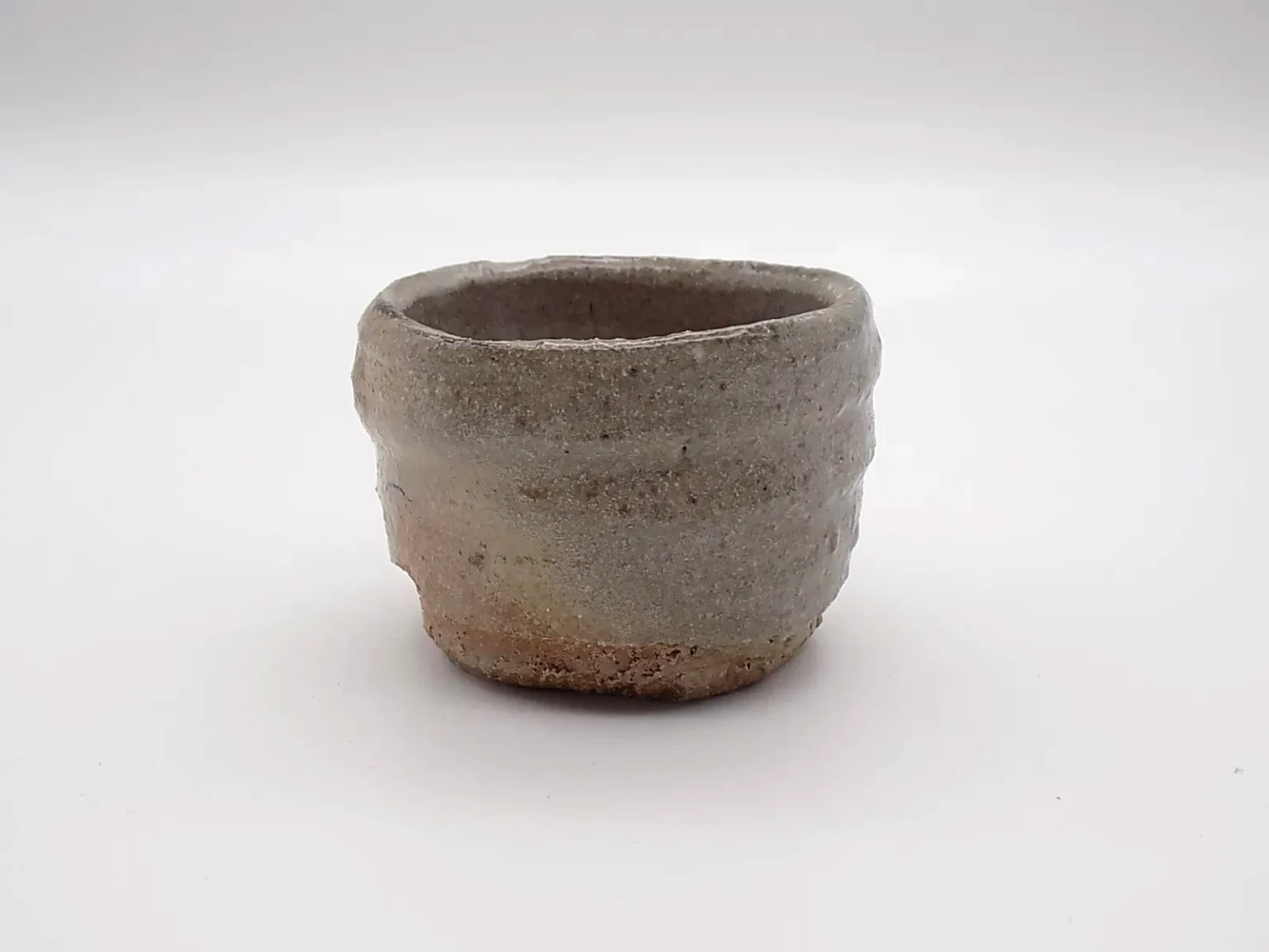 Wheel-thrown asymmetrical wabi-sabi ochoko, top view by Timi Lantos Ceramics