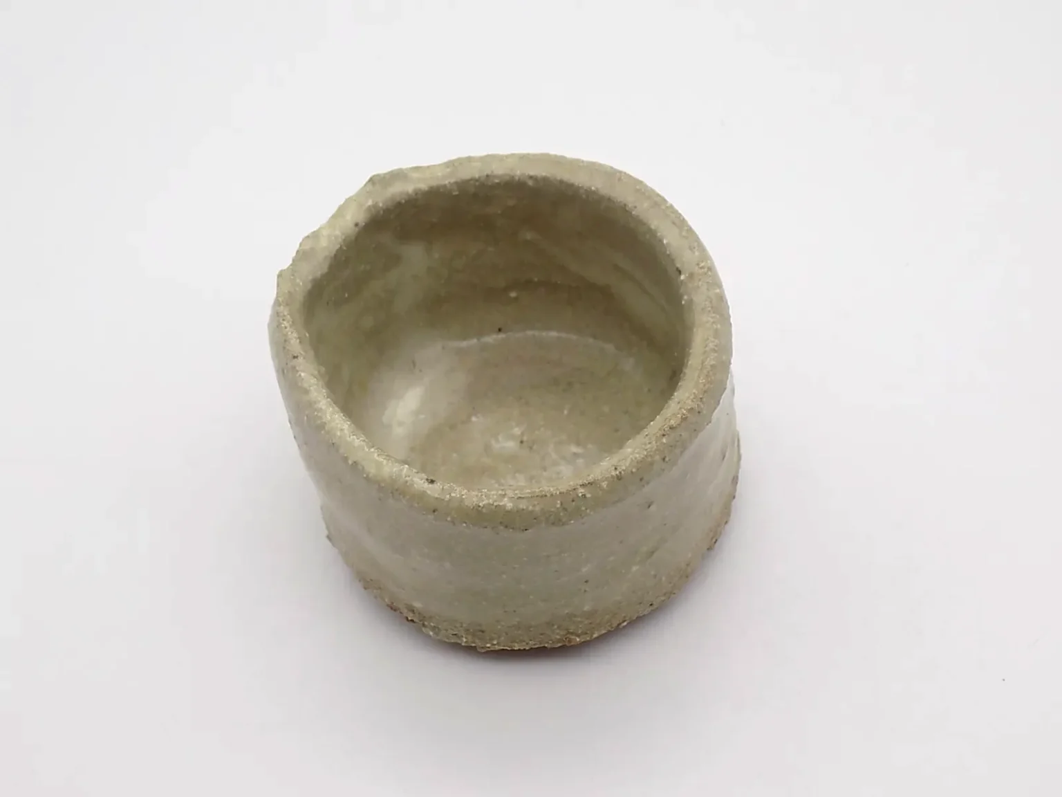 Wheel-thrown minimal beige ochoko, top view by Timi Lantos Ceramics