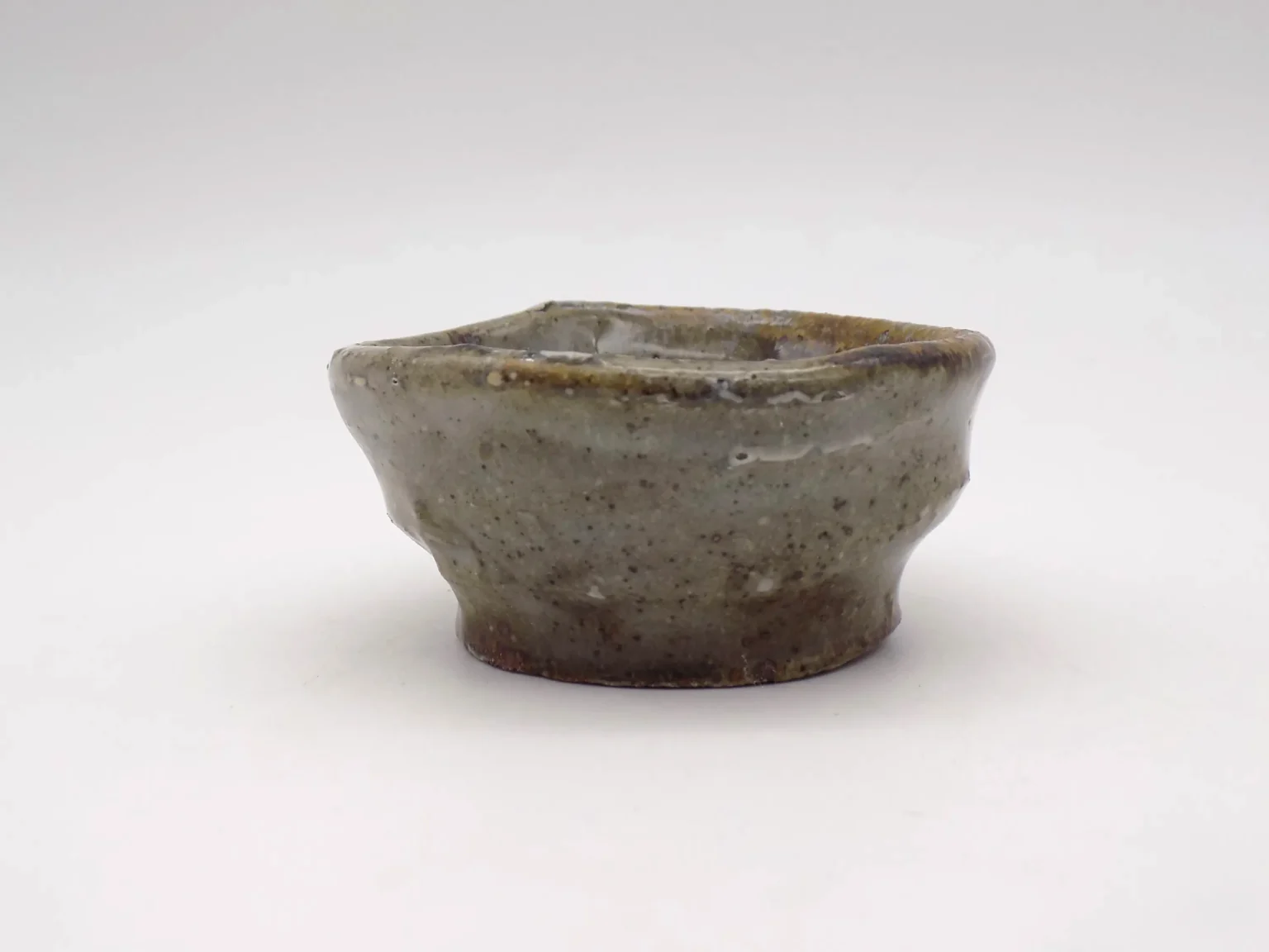 Wheel-thrown sandy brown ochoko, top view by Timi Lantos Ceramics