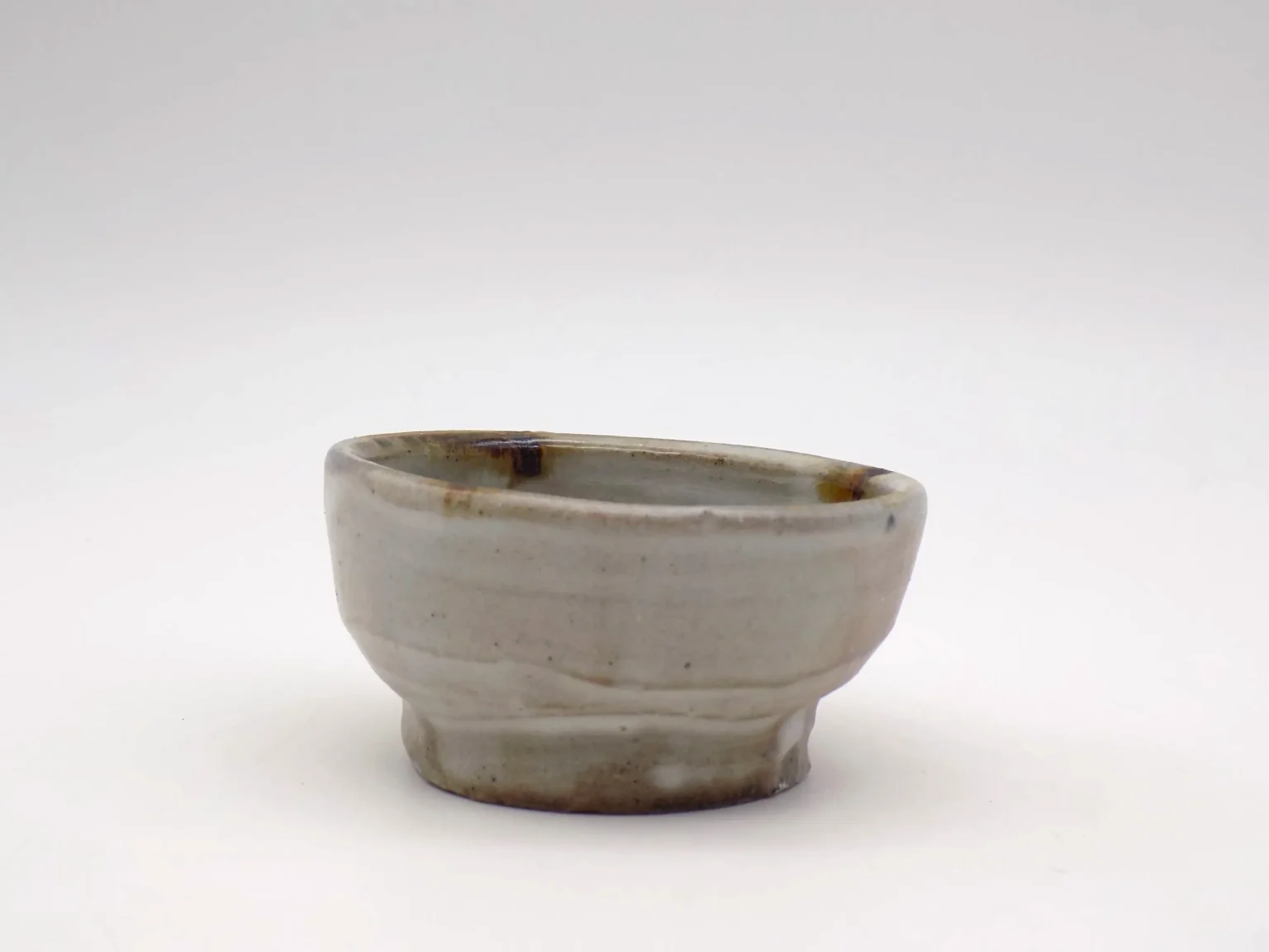 Wheel-thrown minimal white sake cup, detail by Timi Lantos Ceramics