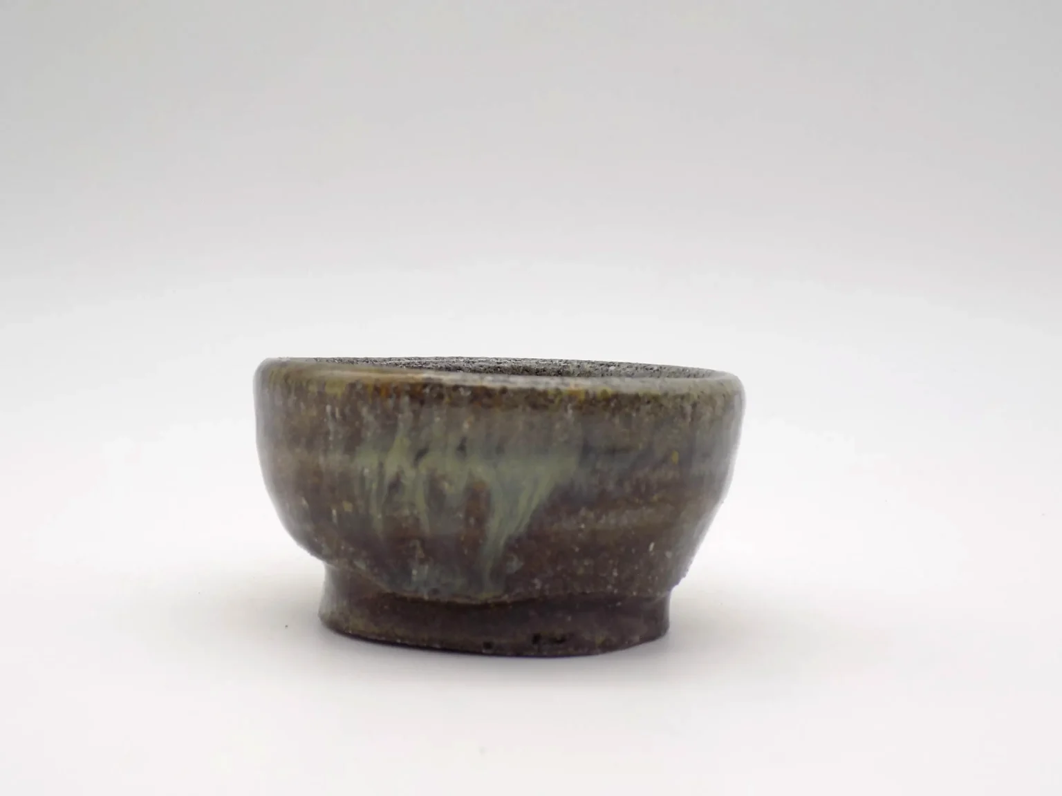 Wheel-thrown minimal white sake cup, side view by Timi Lantos Ceramics