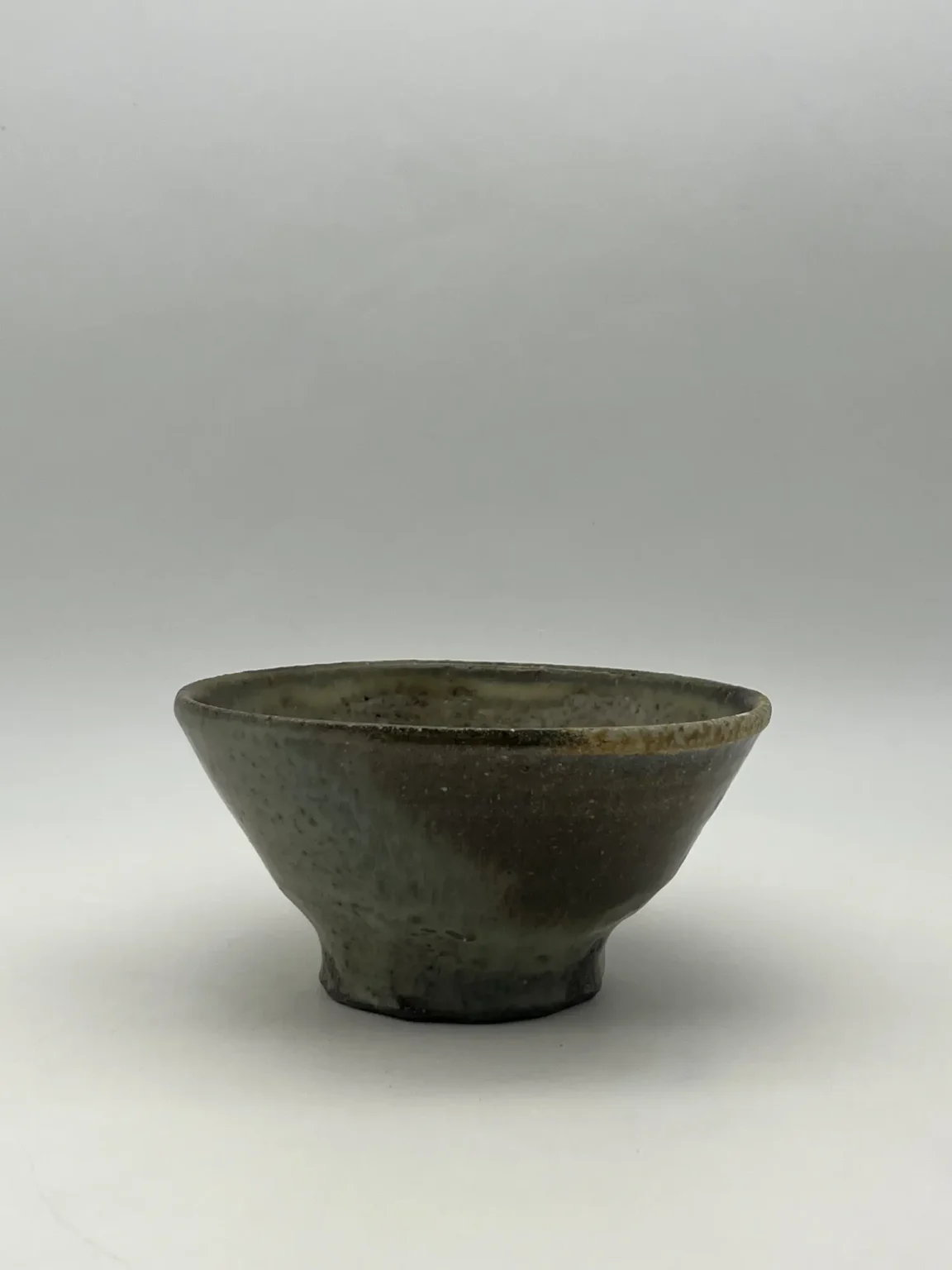 Wood-fired matcha bowl with feldspar glaze gradation by Timi Lantos Ceramics