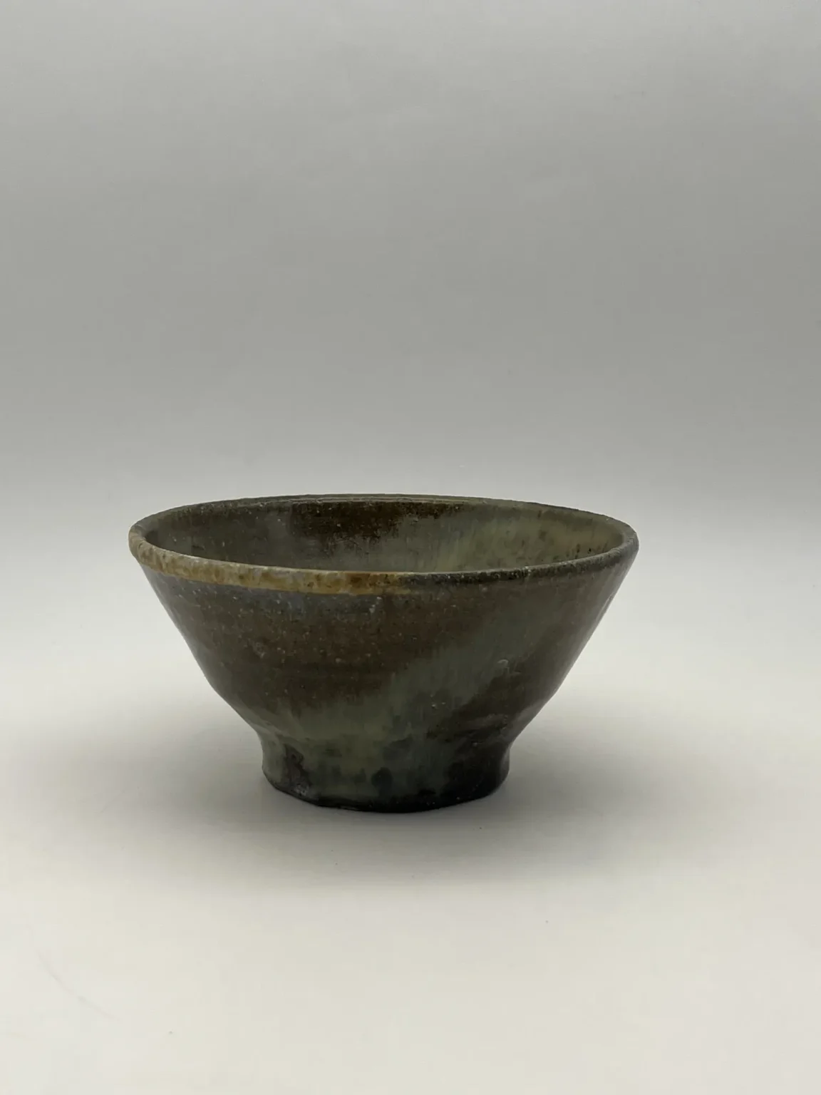 Wood-fired matcha bowl with glaze gradation in Japanese pottery style by Timi Lantos Ceramics