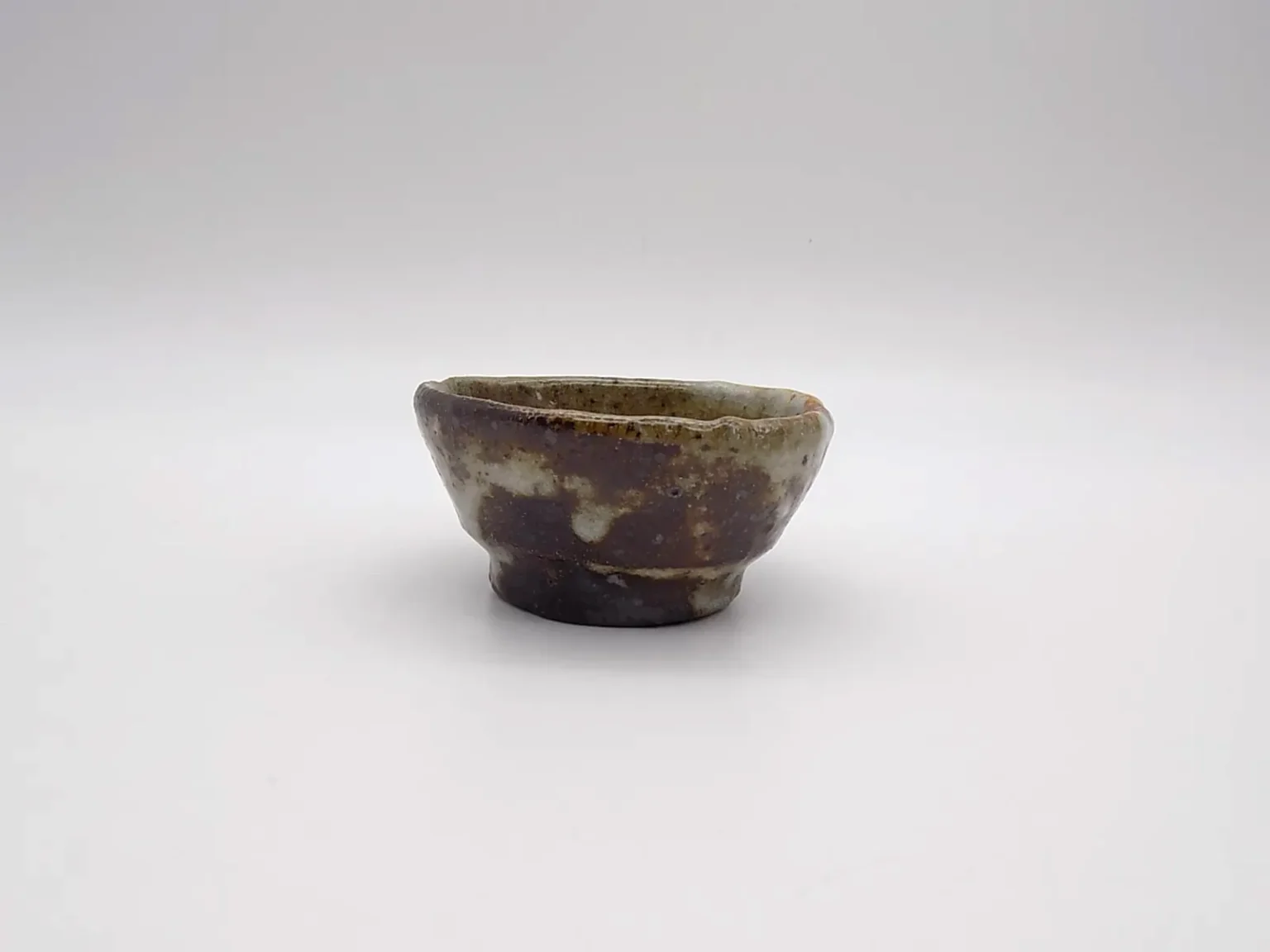 wood fired ochoko ash brown sake cup by Timi Lantos Ceramics