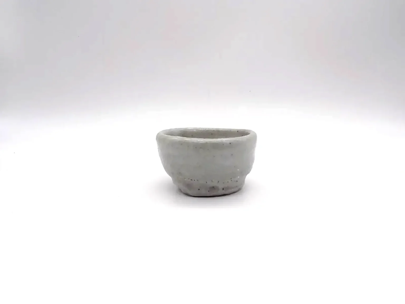 Wood-fired Mino white ochoko by Timi Lantos Ceramics