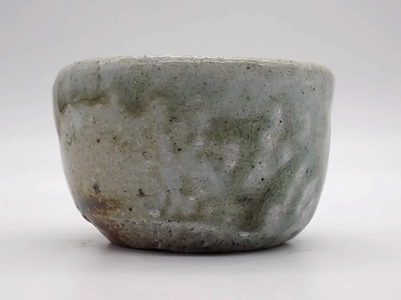 Wood-fired wabi-sabi ochoko, side view by Timi Lantos Ceramics