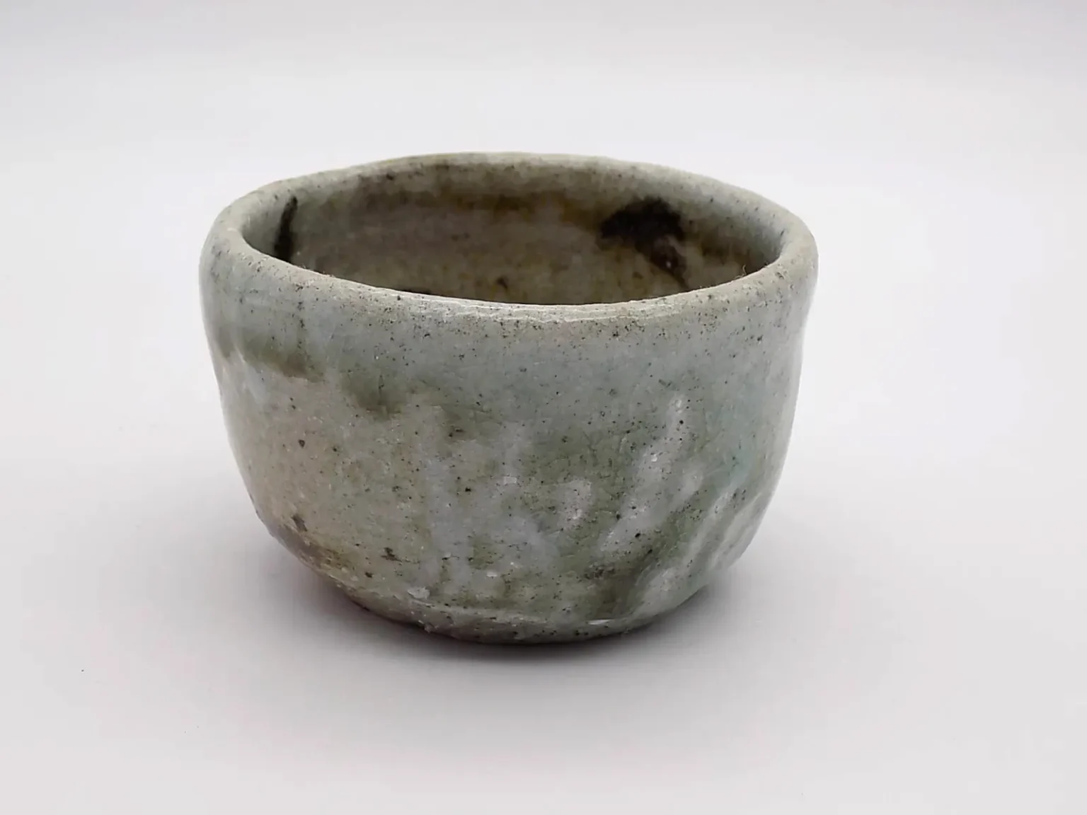 wood fired sake cup ash glaze top view by Timi Lantos Ceramics