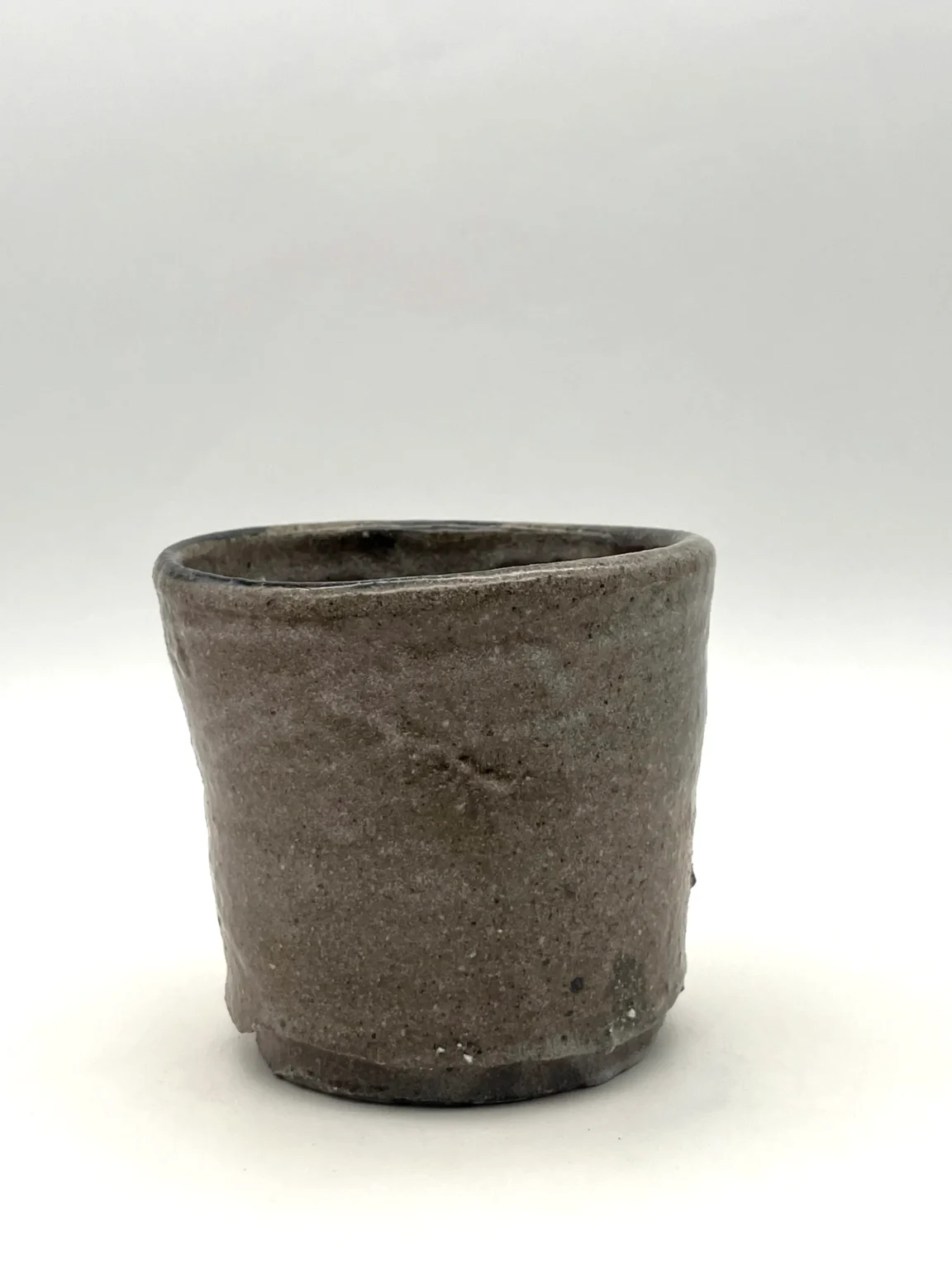 Rustic grey shino glaze yunomi tea cup by Timi Lantos Ceramics