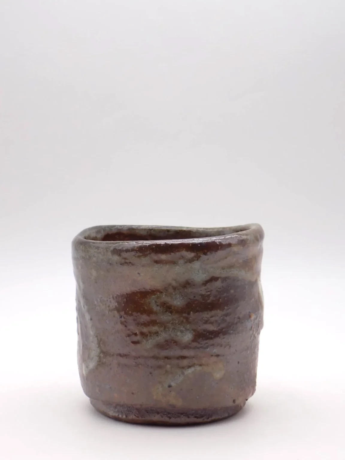 Wood fired freckled yunomi tea cup by Timi Lantos Ceramics