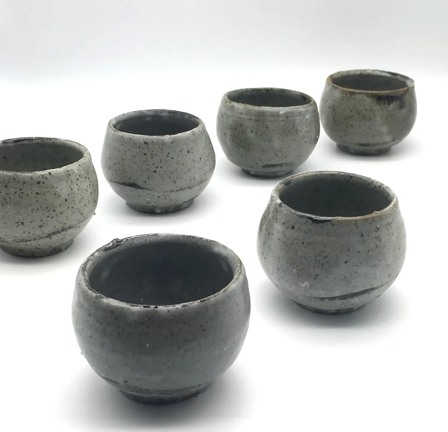Red clay yunomi wheel thrown in Japan by Timi Lantos Ceramics